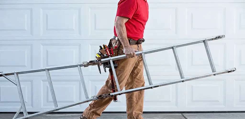 Garage door repair technician arriving with tools and ladder in Allentown, PA