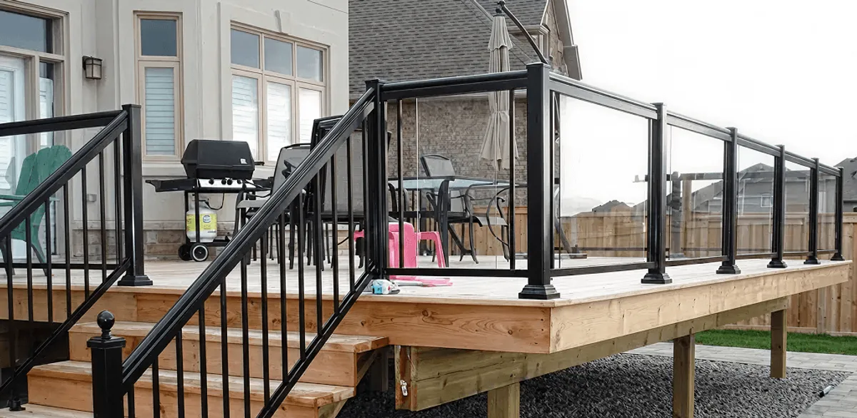 Handrail installation on a deck staircase for safety and code compliance in Allentown, PA