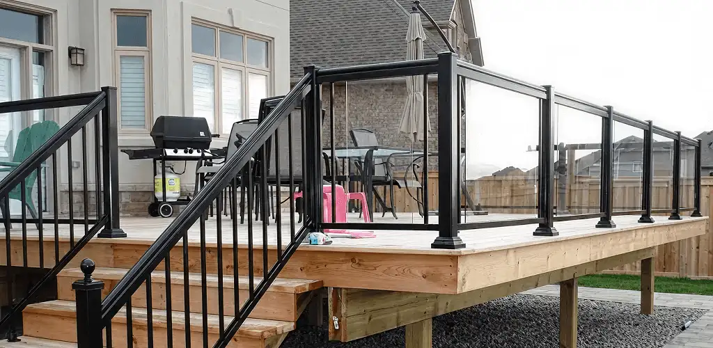 Handrail installation on a deck staircase for safety and code compliance in Allentown, PA